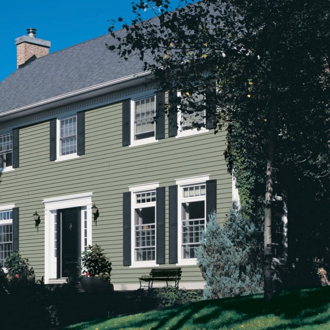 House with Royal® Woodland Vinyl Siding