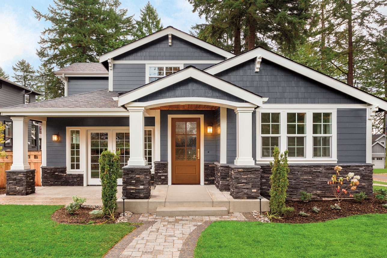 Fiberglass front entry door with glass on modern blue house