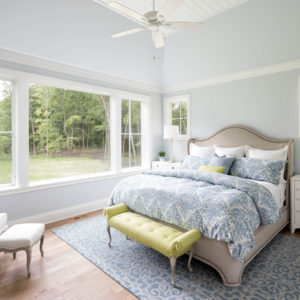 Marvin® fiberglass casement windows in bedroom