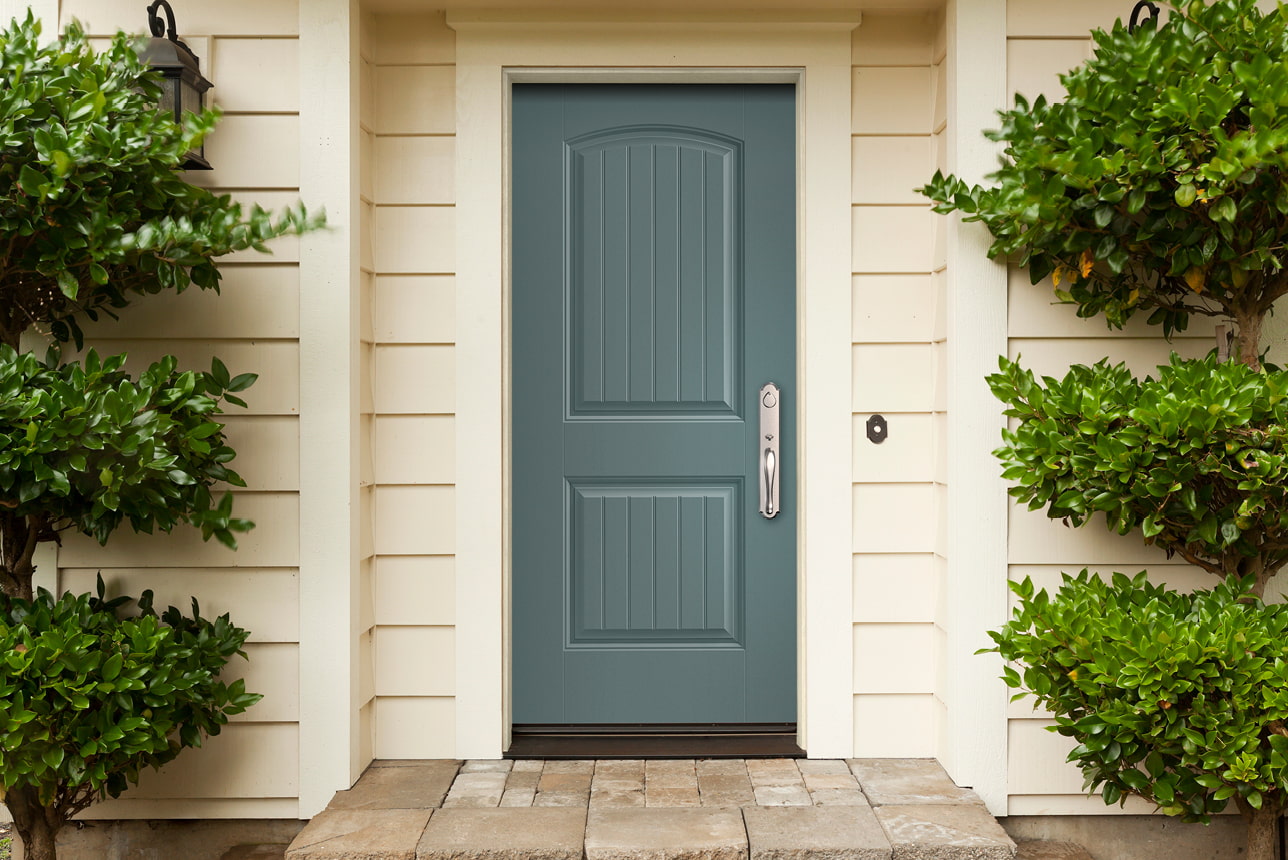 Solid fiberglass entry door in blue
