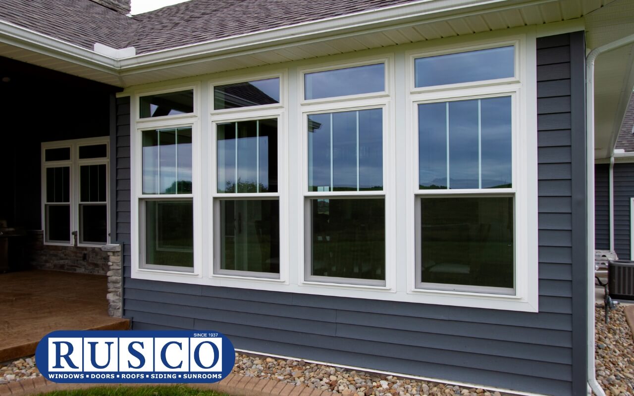 Newly installed vinyl windows on a modern residential home